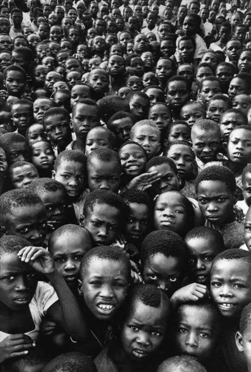 ukpuru: Dissolved Biafra. One Year after the War. Schoolchildren gather in their courtyard. Photo by