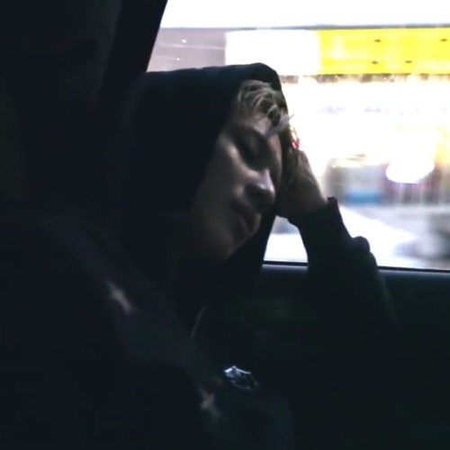Taemin eating dry cereal straight out of the box after a long day of shooting then falling asleep on