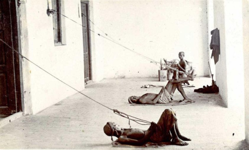 Punkah wallahs in action, British India, early 1900′s. A Punkah-wallahs were manual fan operators in