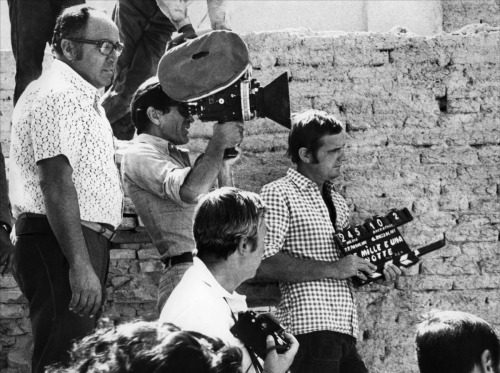 We are on the set of Salò, or the 120 Days of Sodom. Pasolini lets a small camera team led by the journalist Gideon Bachmann follow him around engaging him in a long and extraordinary interview/conversation. The interview turns into a long,...