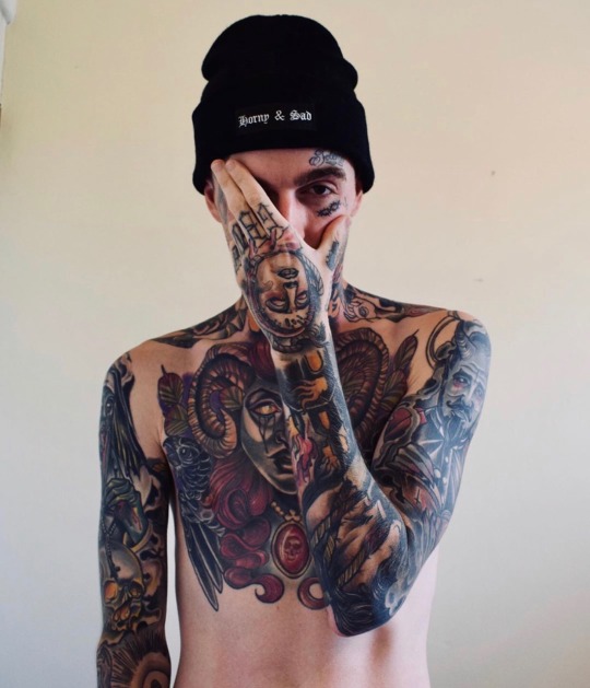 Skinny guys with tattoos