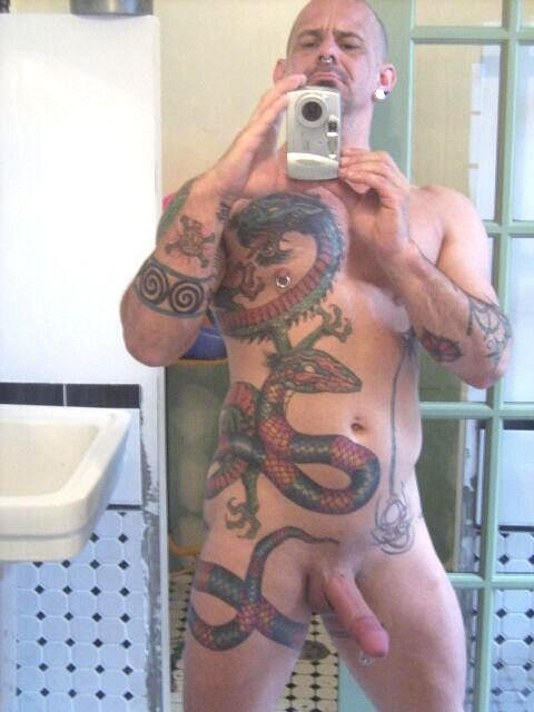 Incredible ink work, amazing cock and the piercings are ideal - WOOF