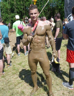 Muscletits:  Showing Off His Medal, And Banana. The One In His Hand. A Tease In The