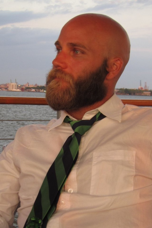 scruffyjizzmonkey:  beardsofnyc:  Chad in Brooklyn       (via TumbleOn)  I wish my beard would grow tame like that. Instead it sticks out in every direction.
