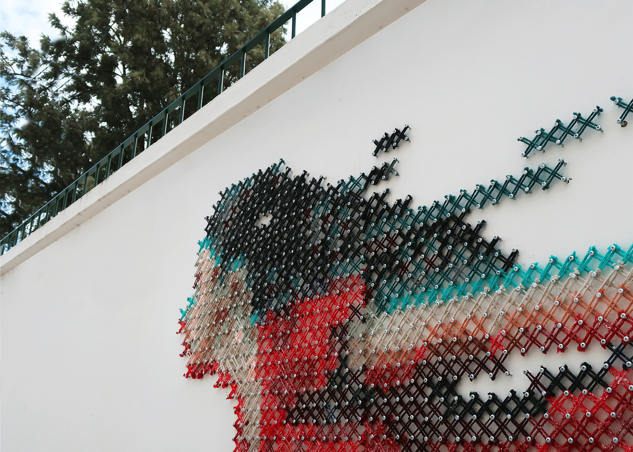 escapekit: Cross Stitched Intervention Portugal-based artist Ana Martins, who works