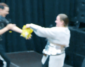 fierceheda:   Katie McGrath getting Pineapple Lumps from a fan (x)