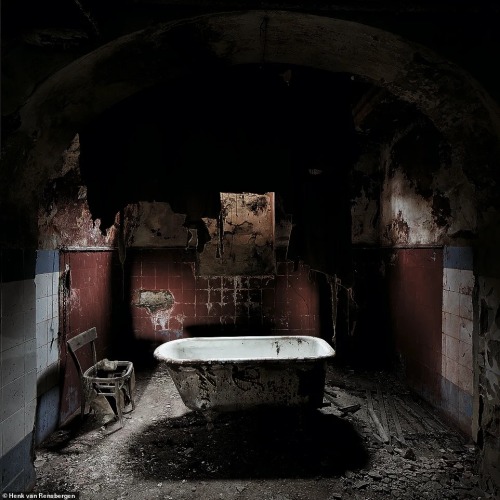 Henk van Rensbergen Photography A bathtub sits in a decaying bathroom in the Abkhazia Parliament bui