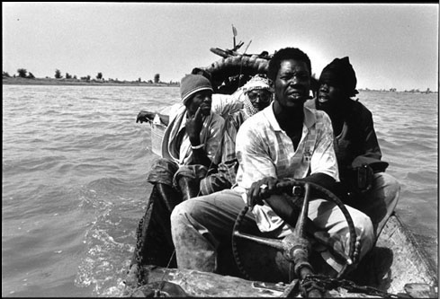 Kadir van Lohuizen: Niger - ocean to ocean (West Africa, 1996)The brown God runs from Guinee, very c