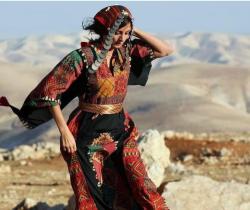 yibnawi:  Palestinian girl wearing national folklore dress Thoub  