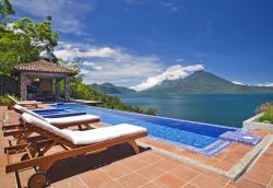 luxuryaccommodations:  Casa Palopo - GuatemalaEnjoying a spectacular setting in the lush Guatemalan Highlands, Casa Palopo overlooks 3 volcanoes and the scenic Lake Atitlan. The hilltop boutique hotel boasts 7 artfully designed suites and a contemporary