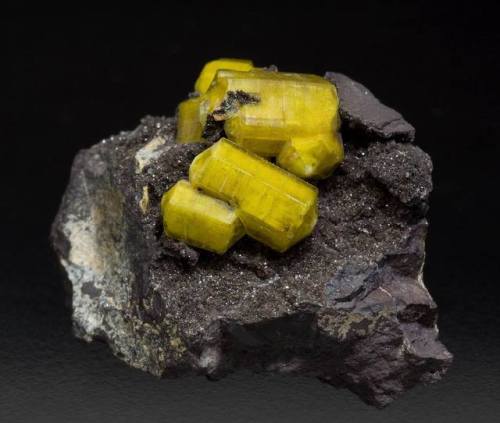 SturmaniteSome minerals only form in geologically uncommon events, and this pretty but complex boros