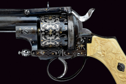 peashooter85:  A gold and silver engraved, ivory handled revolver originating from France, late 19th century. Estimated Value: € 5,000-€ 7,500
