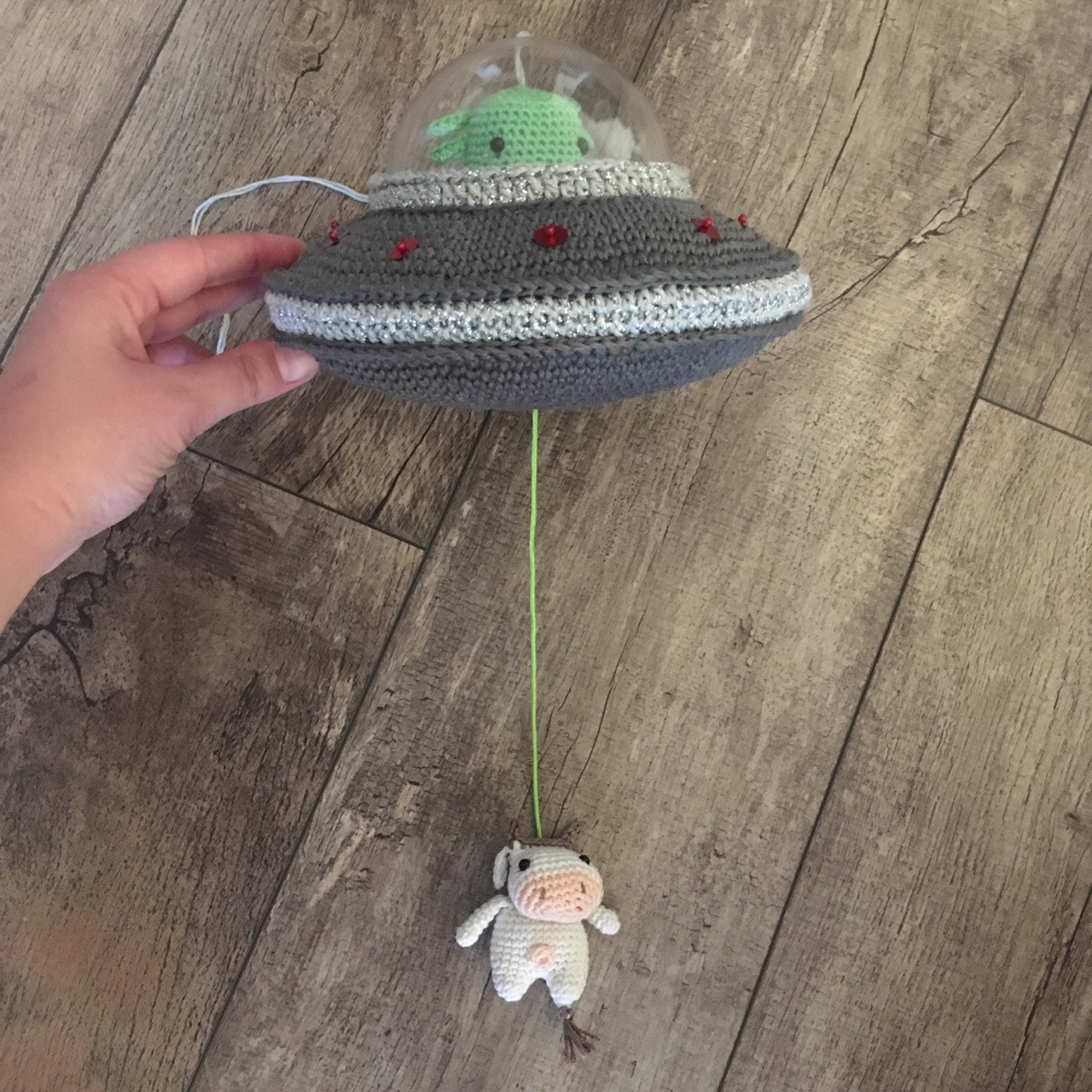 1st-1:tj-crochets:The cow is finally done! This ufo is also a music box; when you pull on the cow, it plays the x-files theme song!