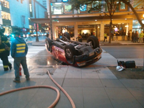 Sorry for the bad photo… Downtown Seattle. Guess what knocked this truck over? ‘Twas a 