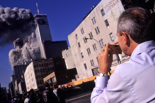 USA. New York City. September 11, 2001. An amateur photographer on Church Street captures the collap