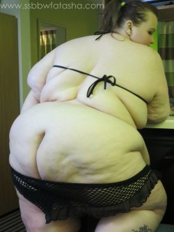 fatashassbbw:  www.ssbbwfatasha.com or bbwsurf.com/Fatasha is updated with a sexy photo set that contains 42 sexy photos of me modeling a beautiful fishnet suit.In this set you will find that i am quite the trickster doing balancing acts of food on my