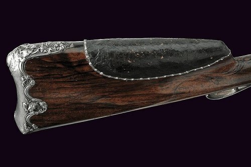 peashooter85:  An ornate silver mounted double barrel flintlock rifle signed Charles Simon.  Charles Simon was the master gunsmith for King Louis XVI from 1765 to 1796.