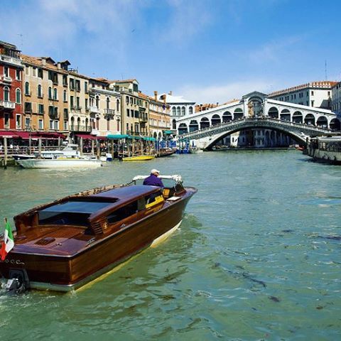 Rialto Bridge in Venice, Italy Venice is a city in northeastern Italy sited on a group of 118 small 