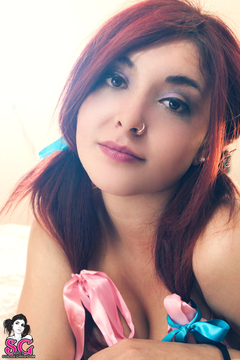 past-her-eyes:  Clemblue Suicide  For more South African SuicideGirls  Sweet tattoo,