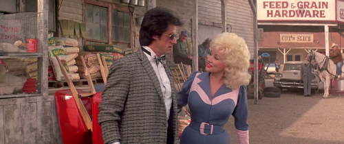 some sylvester stallone & dolly parton looks from rhinestone (1984)