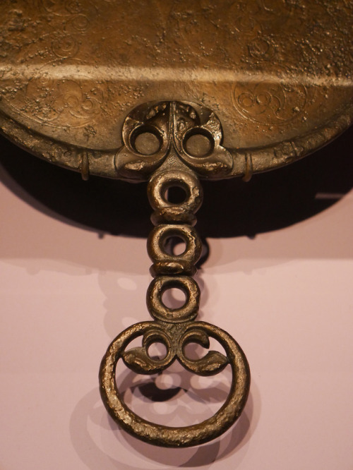 Bronze Age and Iron Age pottery, hand mirror and other artefacts, Royal Albert Museum and Gallery, E