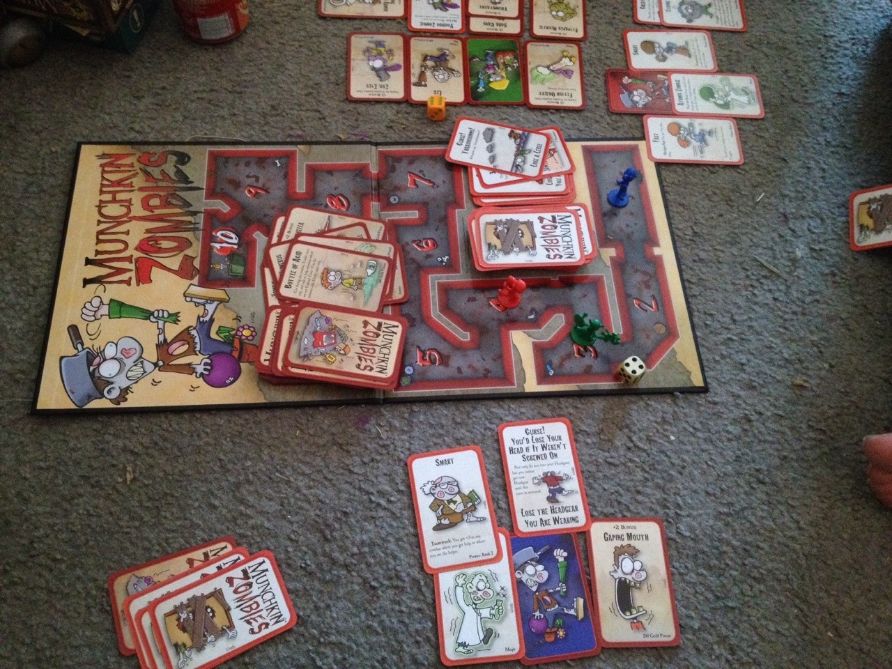 Playing Munchkin Zombies  The lamp shades on the ceilings is from Modern Times Flavordome