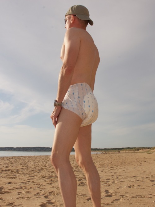 jockediaperlover:  My last vacation pics from the beach, I’m back at work :-/ I’m actually quite shy in my diaper.   VERY sexy diapered man
