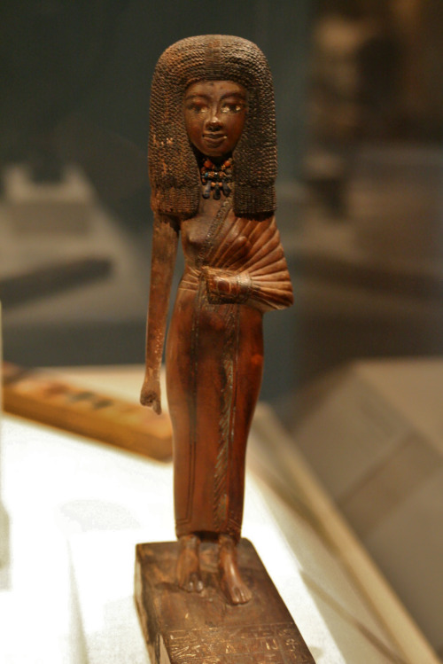 Statuette of TiyeDynasty 181390-1352 B.C.Wood and Faience, Carnelian, Glass and Gold BeadsFrom Fayum