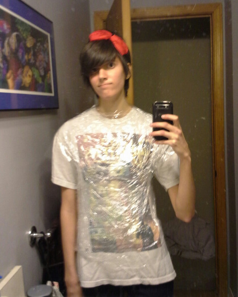 qunaributts:Have some photos of me in a Ghostbusters shirt wrapped in saran-wrap and painters tape f