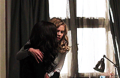 :  I tightened my grip on her arm, digging my nails in to get her attention. She flinched.
