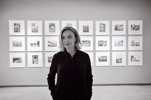 fuckyeahjessicalange: Jessica Lange poses in front of her work during the opening of her photo exhib