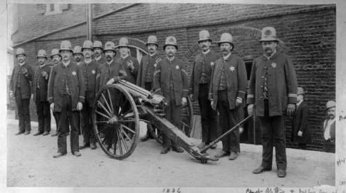 Kansas City Police Department officers posing with their Gatling gun, 1886.
