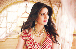 gubaare:  “…..Dressed in crimson redShe looks gracefulOrnaments shimmeringAdding to her beauty