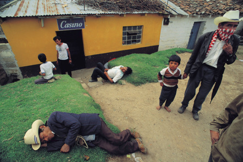 arach-ne:Market day, drunken men in front of a Bodega. Guatemala, San Francisco El Alto. 1991.Photog