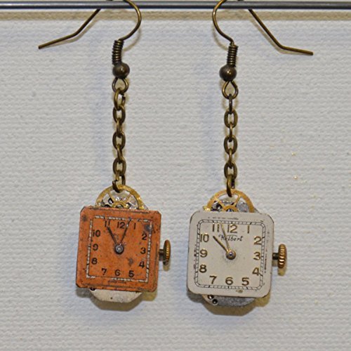 Earrings: Vintage watch with crystals (capri blue) and square dial https://ift.tt/3DVgL7w