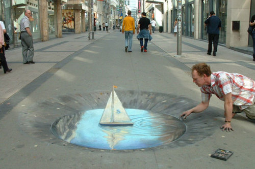 unknowngenre:  3D Pavement Drawings by Julian Beever  Anamorphic illusions are drawn in a special distortion in order to create an impression of 3 dimensions when seen from one particular viewpoint.  more 
