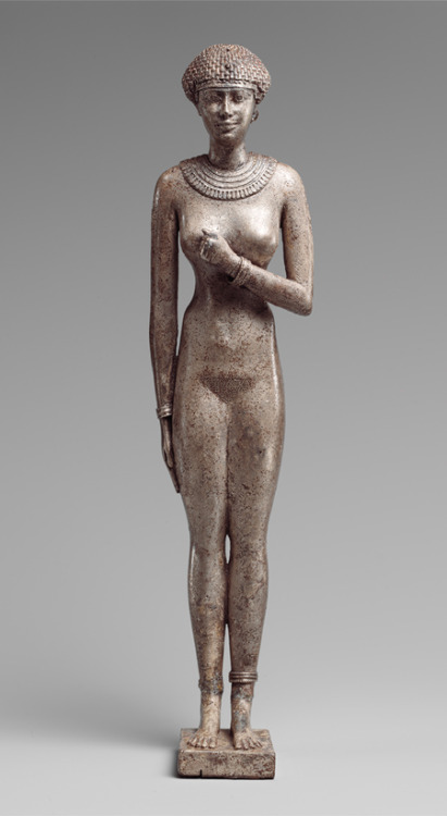 Ancient Egyptian statuette of a Woman, Late Period, Dynasty 26, reign of Necho II, ca. 610–595