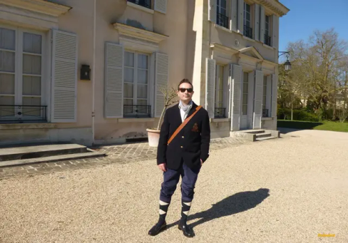 Preppy Men Style In Versailles, Wearing Navyblue Sebago Classic Loafers, Long Burlington Argyle Socks,