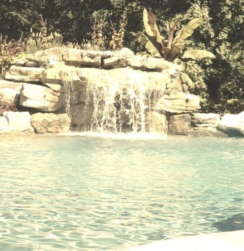 Fountain In New YorkLarge Tropical Backyard Stone And Custom-shaped Infinity Pool Fountain Concept For