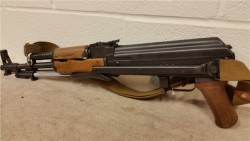 gunrunnerhell:  ConditionAn example of how condition and rarity can affect overall value. The rifle is a Polytech AKS-762 in the very and sought after “double-underfolder” configuration. It shows areas of wear and pitting, which normally on any other