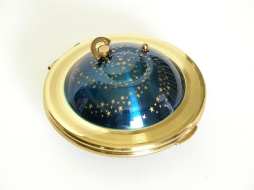 cair–paravel:Flying saucer compact by Kigu, England, 1950s.