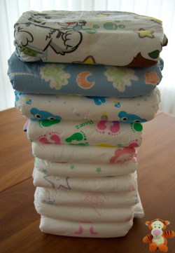 minimaxkiddo:  tiggerjunior:  It’s kind of cool so many AB diapers there are out there….. And I’m still missing some, this is just what i have right now :D    My buddy Tigger sure has an awesome abdl diaper collection going on. =)