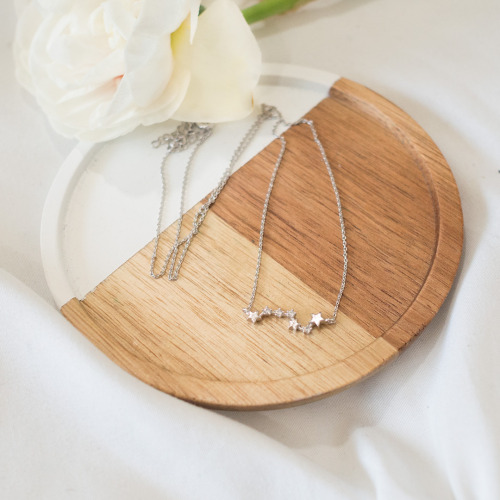 Perfect your look with this dreamy constellation necklace. Shop the look here bit.ly/1qoFTNW