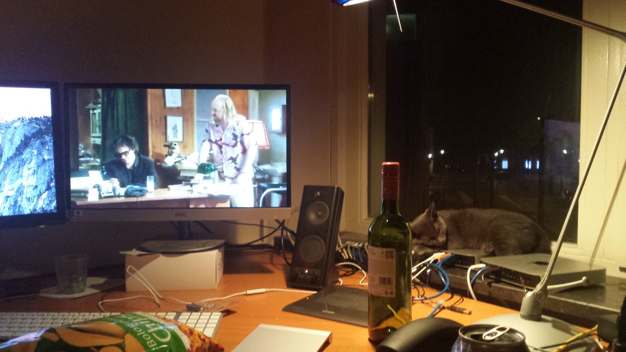 watching black books with a cool friend: good booze and snacks: better they have