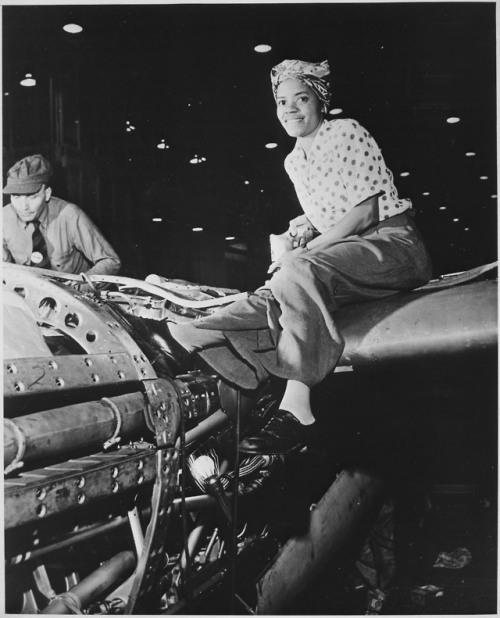 Unidentified riveter at Lockheed Aircraft Corporation, Burbank, California, circa 1940-1945
