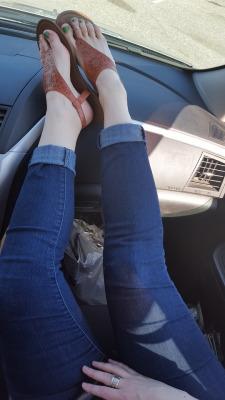 myprettywifesfeet:  myprettywifesfeet:  my pretty wifes sexy feet on the dash with her newest toe ring on.please comment   Another cute one from my archives 