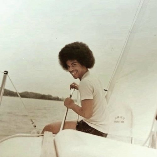 equatorjournal:Prince sailing on his boat, Lake Minnetonka, summer 1977.