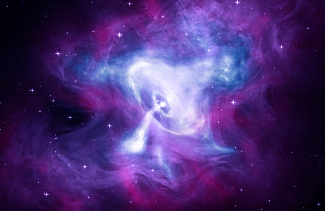 In this multiwavelength image, the central object resembles a semi-transparent, spinning toy top in shades of purple and magenta against a black background. The top-like structure appears to be slightly falling toward the right side of the image. At its center is a bright spot. This is the pulsar that powers the nebula. A stream of material is spewing forth from the pulsar in a downward direction, constituting what would be the part of a top that touches a surface while it is spinning. Wispy purple light accents regions surrounding the object. This image combines data from NASA's Chandra, Hubble, and Spitzer telescopes. Credit: X-ray: NASA/CXC/SAO; Optical: NASA/STScI; Infrared: NASA-JPL-Caltech