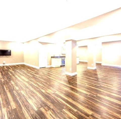 Transitional Family RoomLarge Transitional Open Concept Vinyl Floor And Brown Floor Family Room Photo