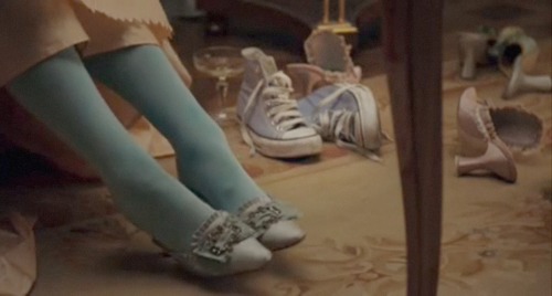 francounjamed: “When Marie-Antoinette is going through her shoes while preparing for a big party you see a pair of blue Converse All Star 1923 Chuck Taylor basketball shoes for about one and a half seconds. While these shoes were definitely not